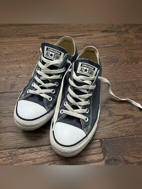 Navy low top converse size W9 M7